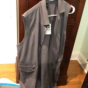 Sleeveless jacket. Brand new. With tags
